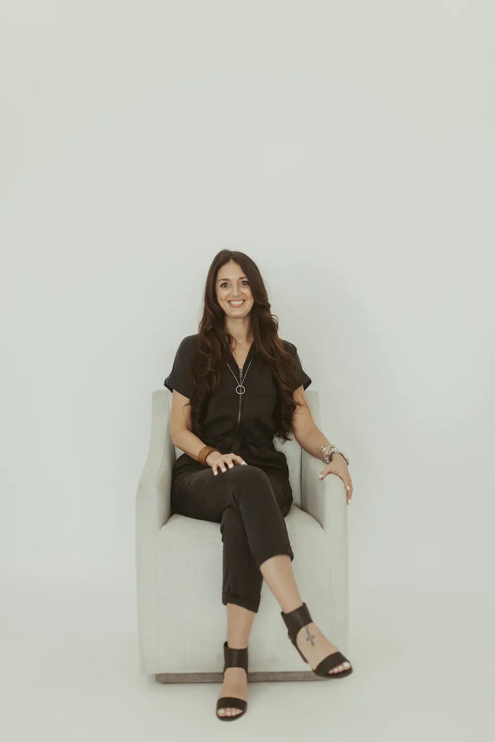 Jess Rebelo providing trauma-informed life coaching to help overcome challenges and improve well-being.